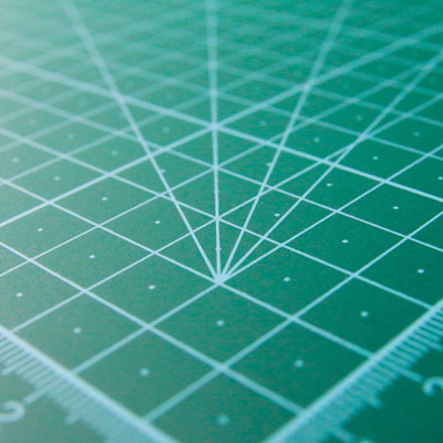 closeup photo detail of cutting mat grid, by Glen Carrie for Unsplash.